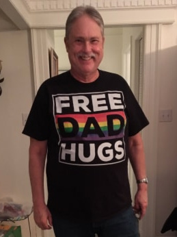 David Mercer In Free Dad Hugs Shirt